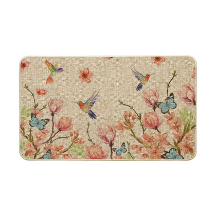 Artoid Mode hummingbird butterfly flowers doormat front view with seasonal charm