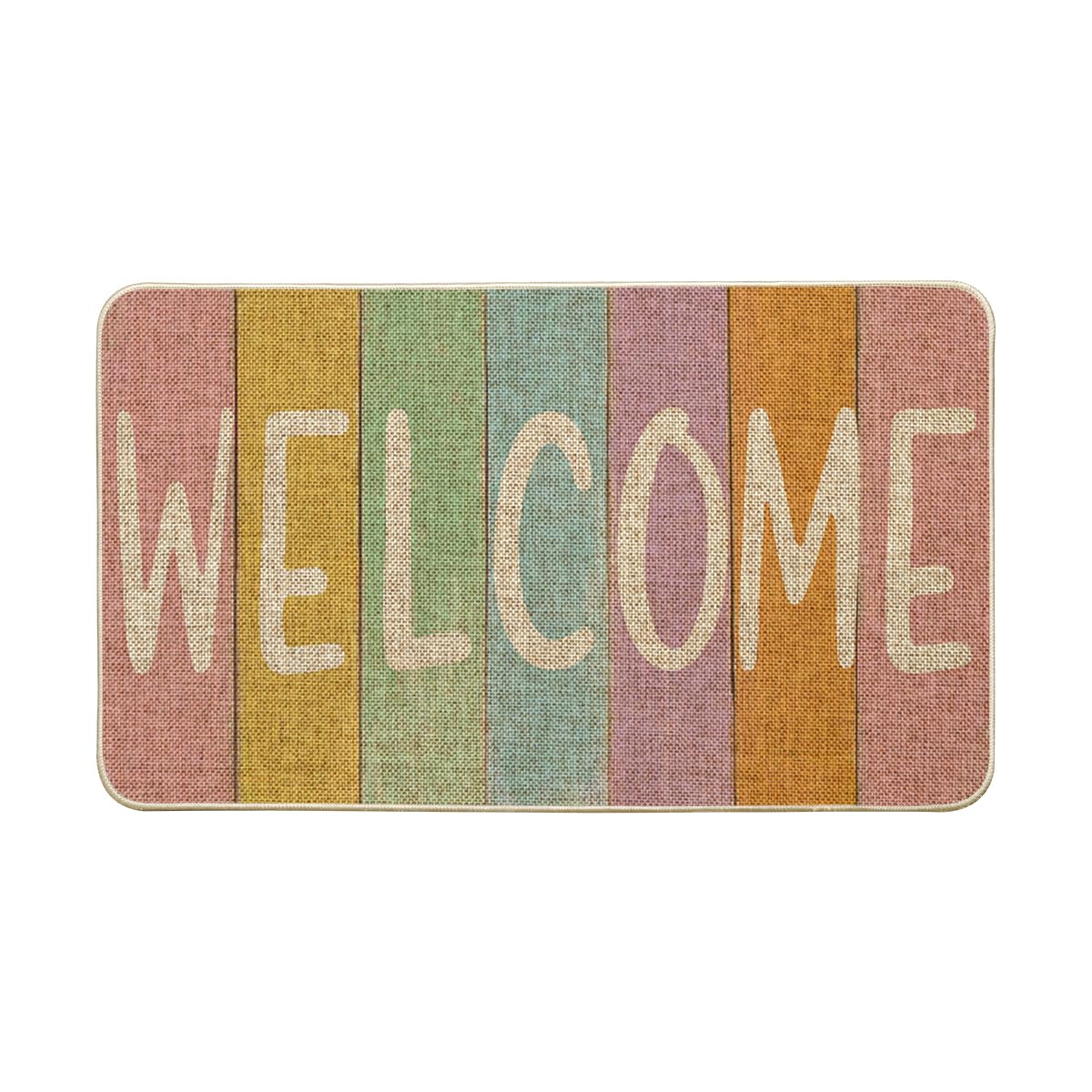 Artoid Mode Stripes Welcome Easter Doormat greets guests at indoor or outdoor entry with seasonal flair.