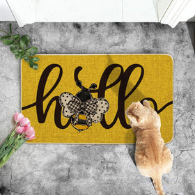 Artoid Mode yellow bee mat outdoors on porch steps displaying low-profile edge