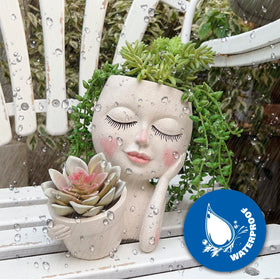 ASDFG decorative face pot ideal for windowsills, shelves, and desks.