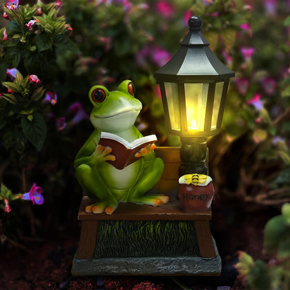 ASDFG Frog Garden Statue with LED light enhances outdoor spaces.