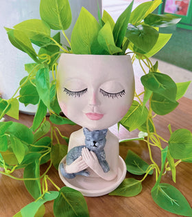 ASDFG resin art vase face planter, decorative and durable.