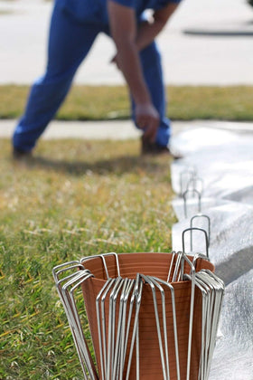AshmanOnline multiuse stakes used with dog fence and erosion control