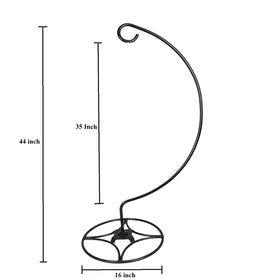 AshmanOnline shepherd hook stand suspends a lantern for warm evening ambiance.