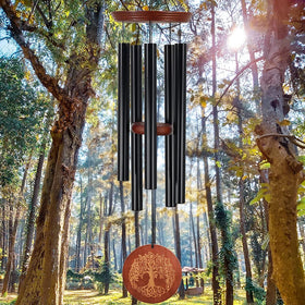 Astarin FSC-certified wood plates and wind traps bring natural charm.