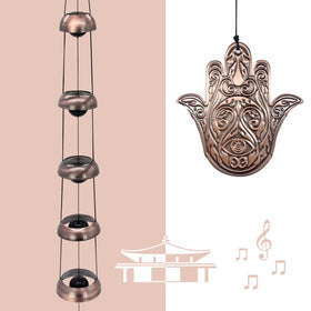 ASTARIN Hand of God medallion centers this chime, offering symbolic protection and tranquil tones.
