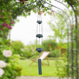 ASTARIN Temple Wind Chimes create harmonious tones for peaceful garden moments.