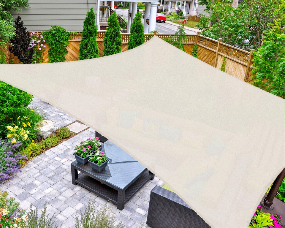 AsterOutdoor sun shade rectangle 12x16 cream used over patio for cooling shade.