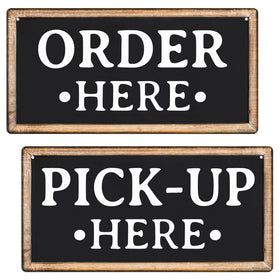ATX Custom Signs Order Here sign with wood-look finish guides customers indoors.