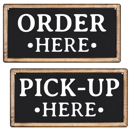 ATX Custom Signs Order Here sign with wood-look finish guides customers indoors.