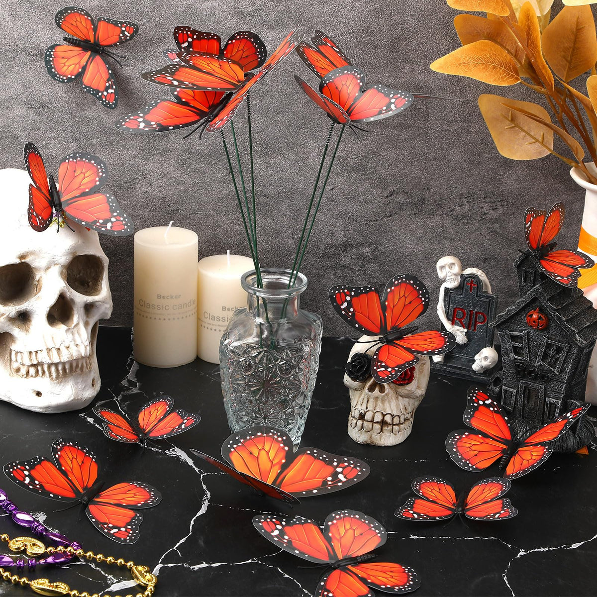 Augshy 3D monarch butterfly stakes provide dramatic party backdrop