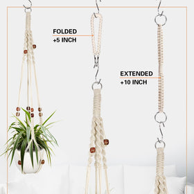 Augshy macrame hanging planter indoors enhances balcony or shelf displays.