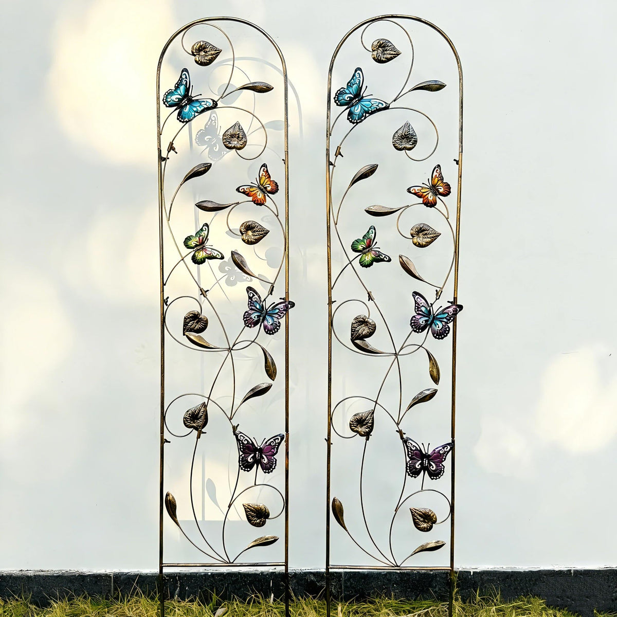 Aura7Mix 2-pack trellis with butterfly accents supports climbing plants and adds color.