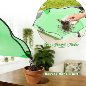 Austion repotting mat corners snapped into a shallow dish to trap debris.