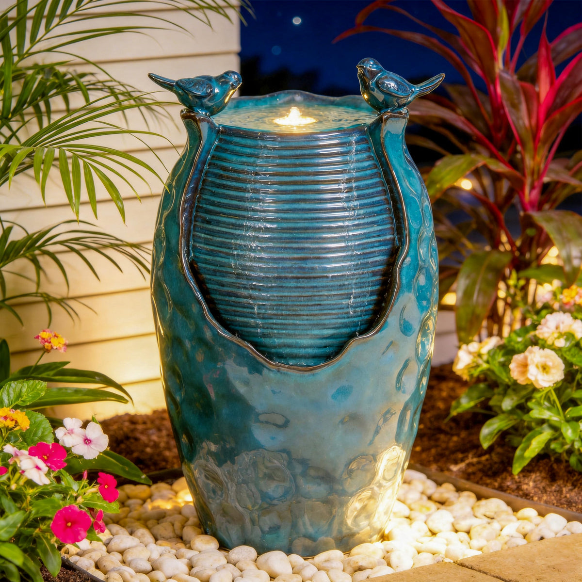 Autodaya ceramic jar fountain with turquoise glaze enhances outdoor curb appeal.