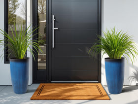 Autodaya tall planters create a focal display with tropical greenery