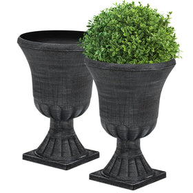 Autodaya urn planter in washed black finish complements exterior decor.