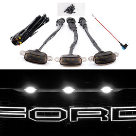 Auxlight 3-pack white grille lights installed on Ford F-150 for brighter front visibility
