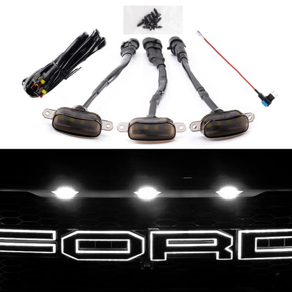 Auxlight 3-pack white grille lights installed on Ford F-150 for brighter front visibility