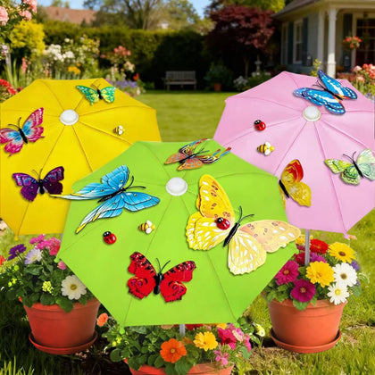 Avalessia plant umbrella in yellow with butterfly decor protecting sun damp pots