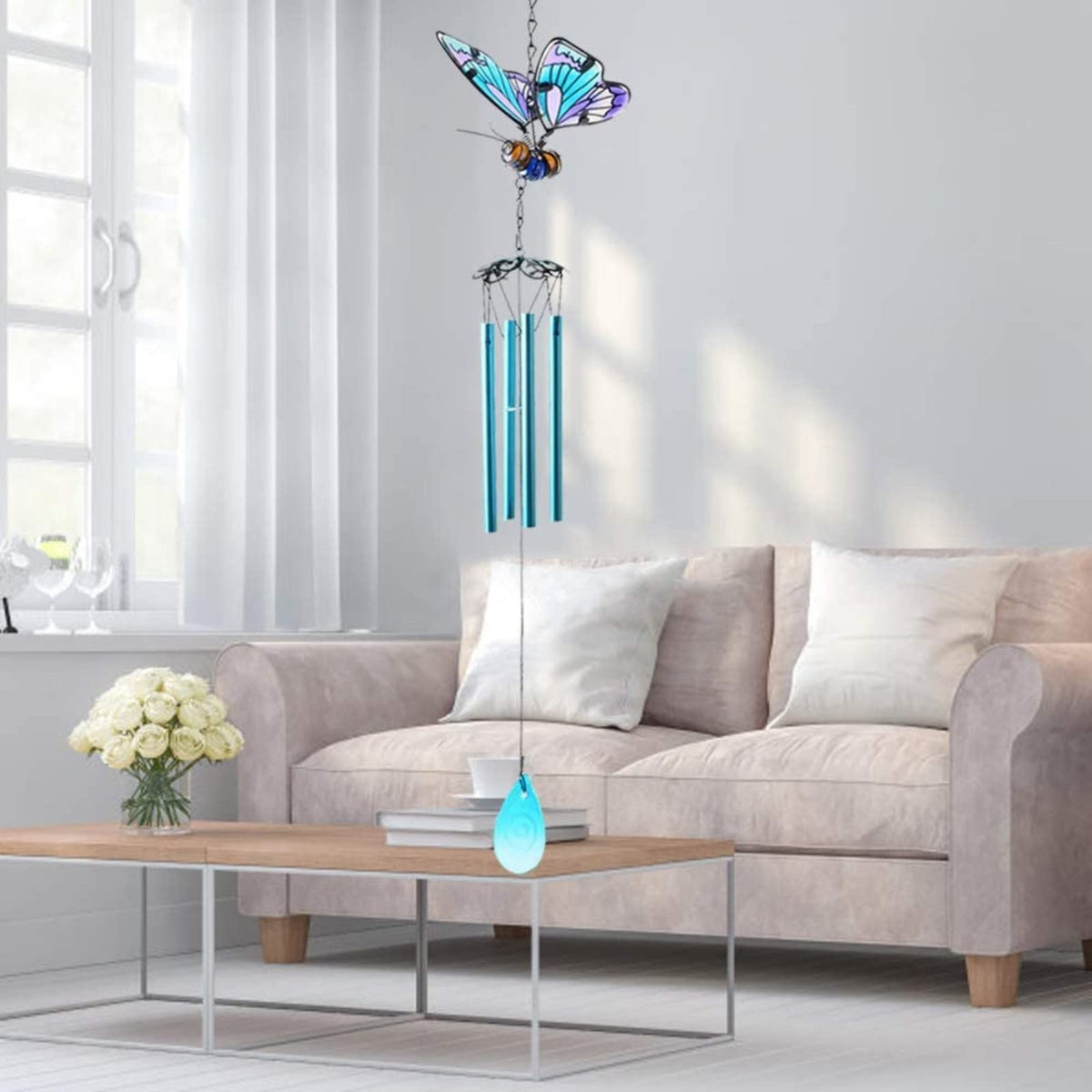 AVEKI iron craft butterfly wind chime offers durable outdoor decor that resists rain.