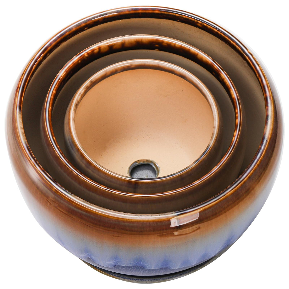 AVLA planters drainage hole closeup highlighting practical watering and airflow.