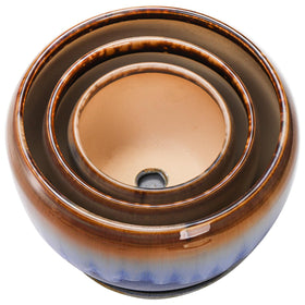 AVLA planters drainage hole closeup highlighting practical watering and airflow.