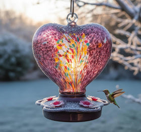 Awa Nest hand-blown glass hummingbird feeder with purple body for gardens