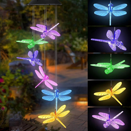 AWENDIETOU dragonfly solar wind chimes illuminate the garden with a soft multicolor glow.