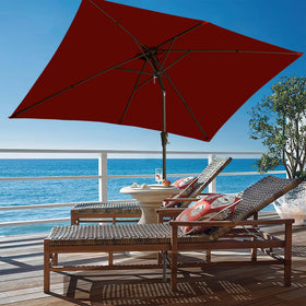 Ayge 6.5x10ft rectangular patio umbrella red fabric adds vibrant outdoor style.