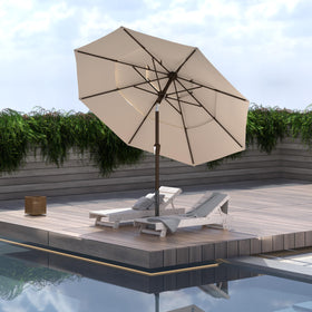 Ayge beige outdoor umbrella on a deck setting