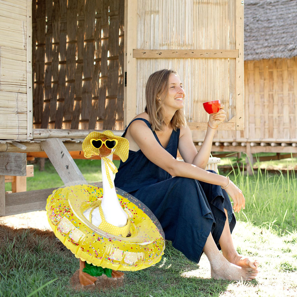 Aymolas summer party setup features porch geese in Hawaii-inspired attire