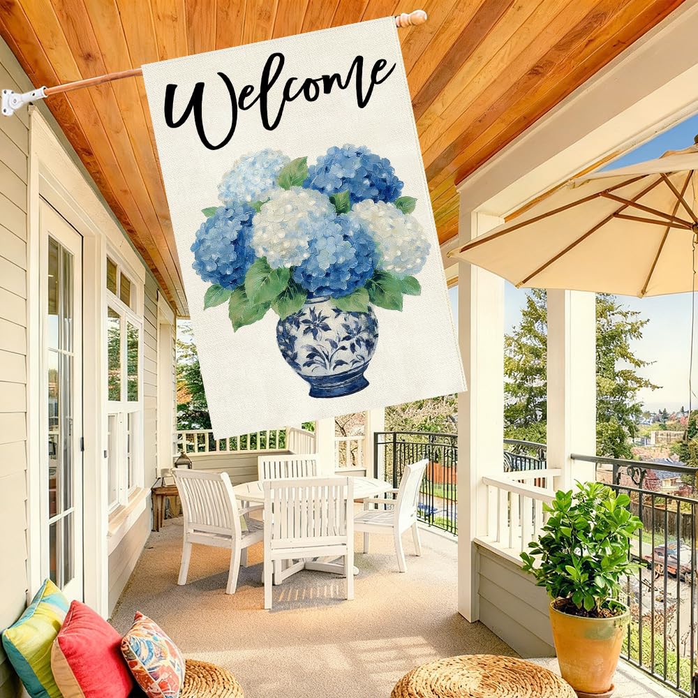 Baccessor blue white porcelain flag features hydrangea motif on durable burlap.