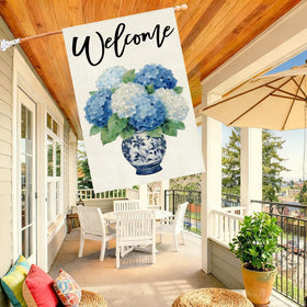 Baccessor blue white porcelain flag features hydrangea motif on durable burlap.