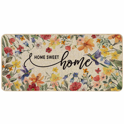 Baccessor Home Sweet Home floral doormat at the front entryway with spring blooms