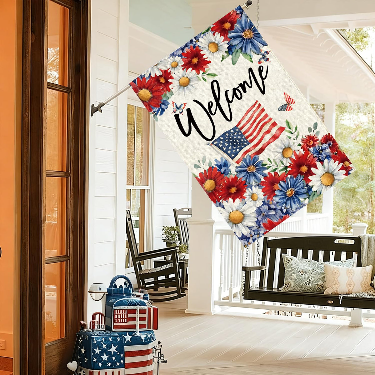 Baccessor Patriotic Daisy House Flag 28x40 on porch during 4th of July celebration.