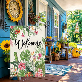 Baccessor flag featuring monstera leaf motif adds lush greenery to yard entrances