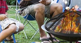 RV camping setup with screen and gloves.