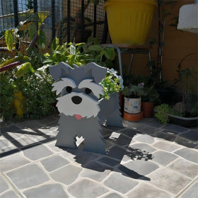 Bamboo's Grocery LoKii gray Schnauzer planter in outdoor display balances stability and charm.