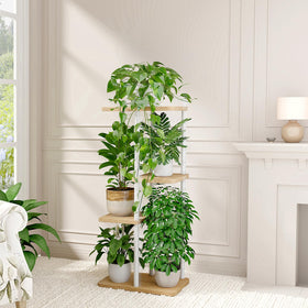 Bamworld 4-tier plant display stand installed in a corner of a living room.