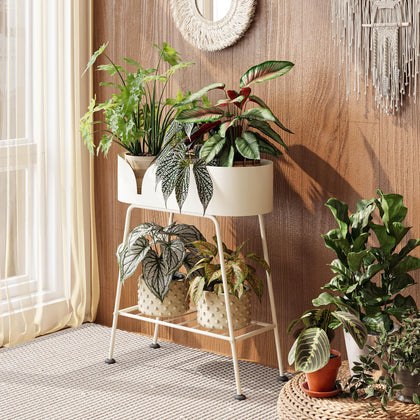 Bamworld 2-tier white plant stand displaying tall greenery indoors and outdoors.