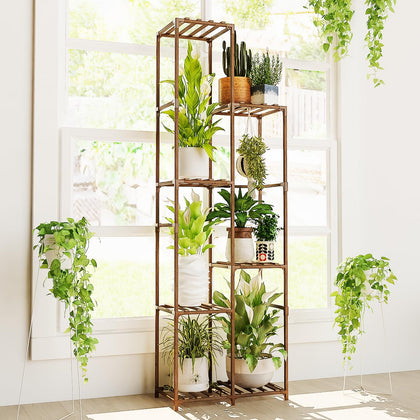 Bamworld 7-tier wood plant stand in living room corner elevates tall plants.