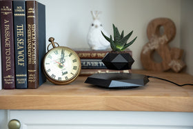 BandDlevs magnetic levitation system operates quietly for subtle ambiance.