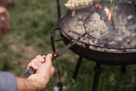 Barebones shovel blade durability supports frequent coal handling around outdoor fires