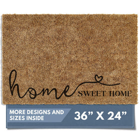 Barnyard Designs doormat with Home Sweet Home script welcoming guests at the door