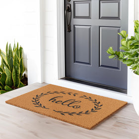 Barnyard Designs brown front door welcome mat enhances curb appeal