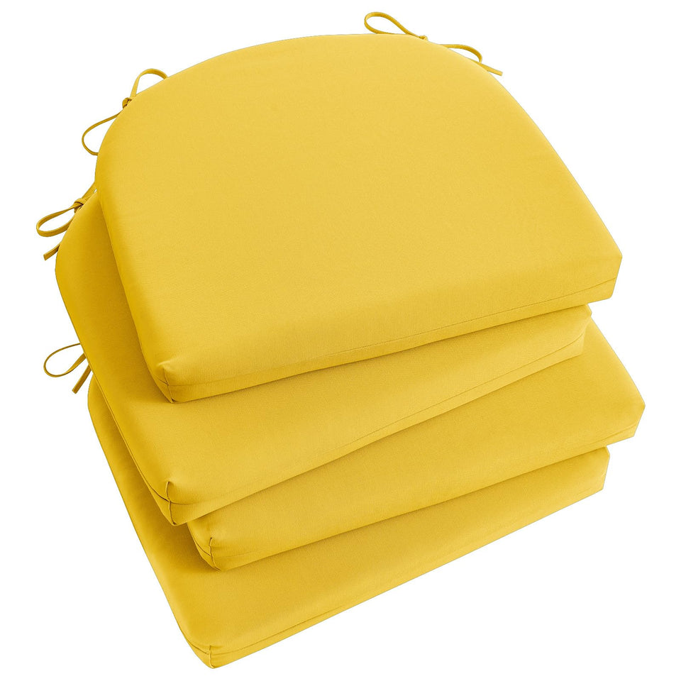 Basic Beyond yellow outdoor chair cushions four-pack for comfy patio seating.