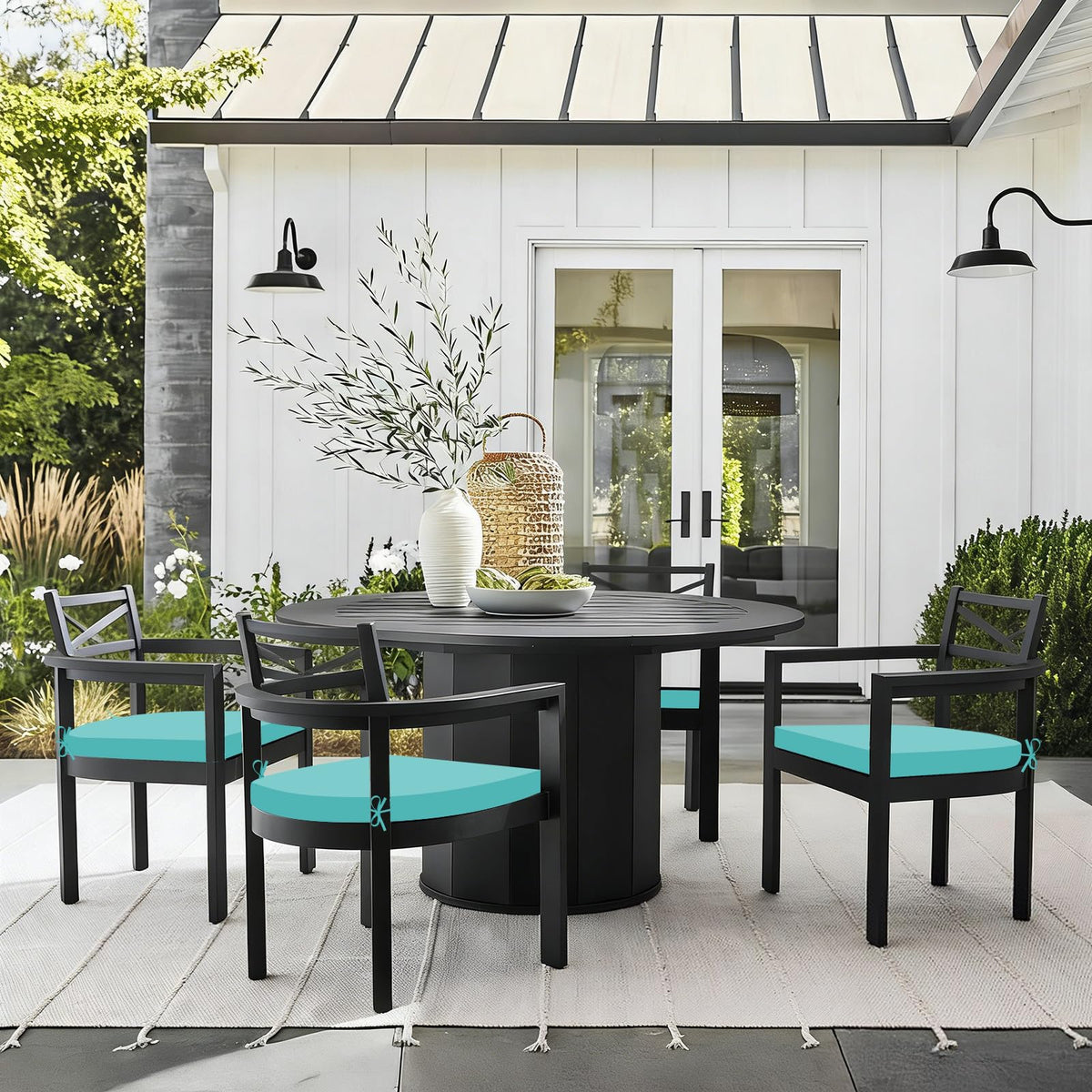 Basic Beyond fade-resistant polyester cover on teal outdoor cushions.
