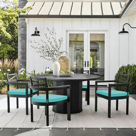Basic Beyond fade-resistant polyester cover on teal outdoor cushions.