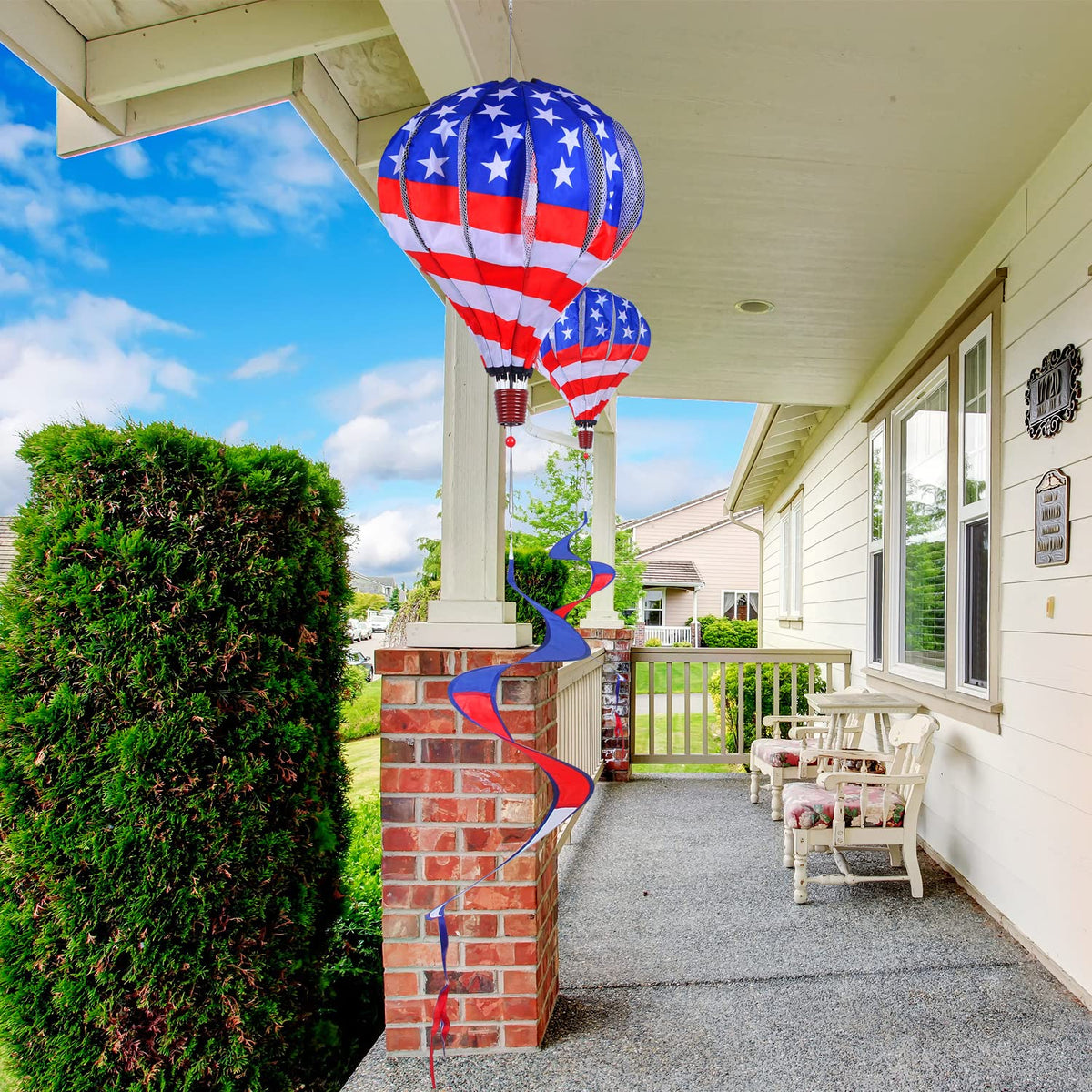 BATTIFE garden decoration in motion as wind sweeps across yard